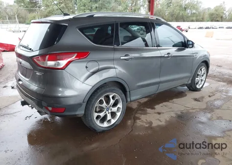 2014 Ford Escape Titanium z USA, uszkodzony, nr VIN 1FMCU9J92EUA69822